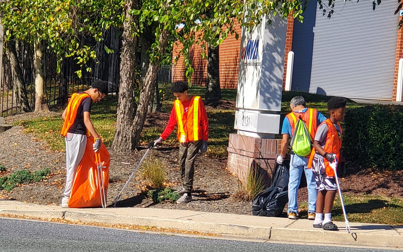 FAA volunteers clearing litter along a neighbourhood road