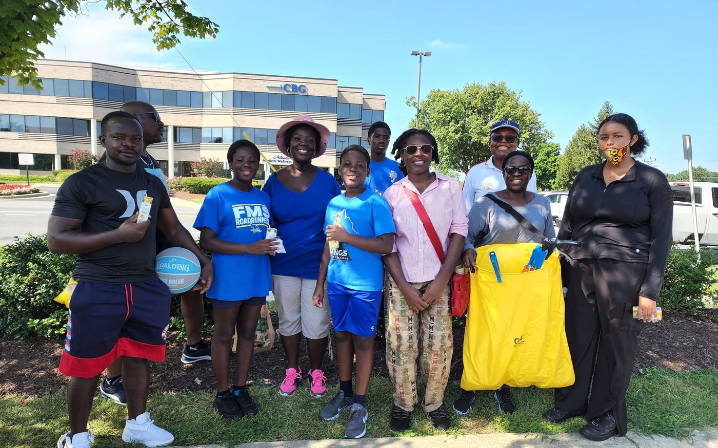 FAA volunteers gathered together after a community clean-up